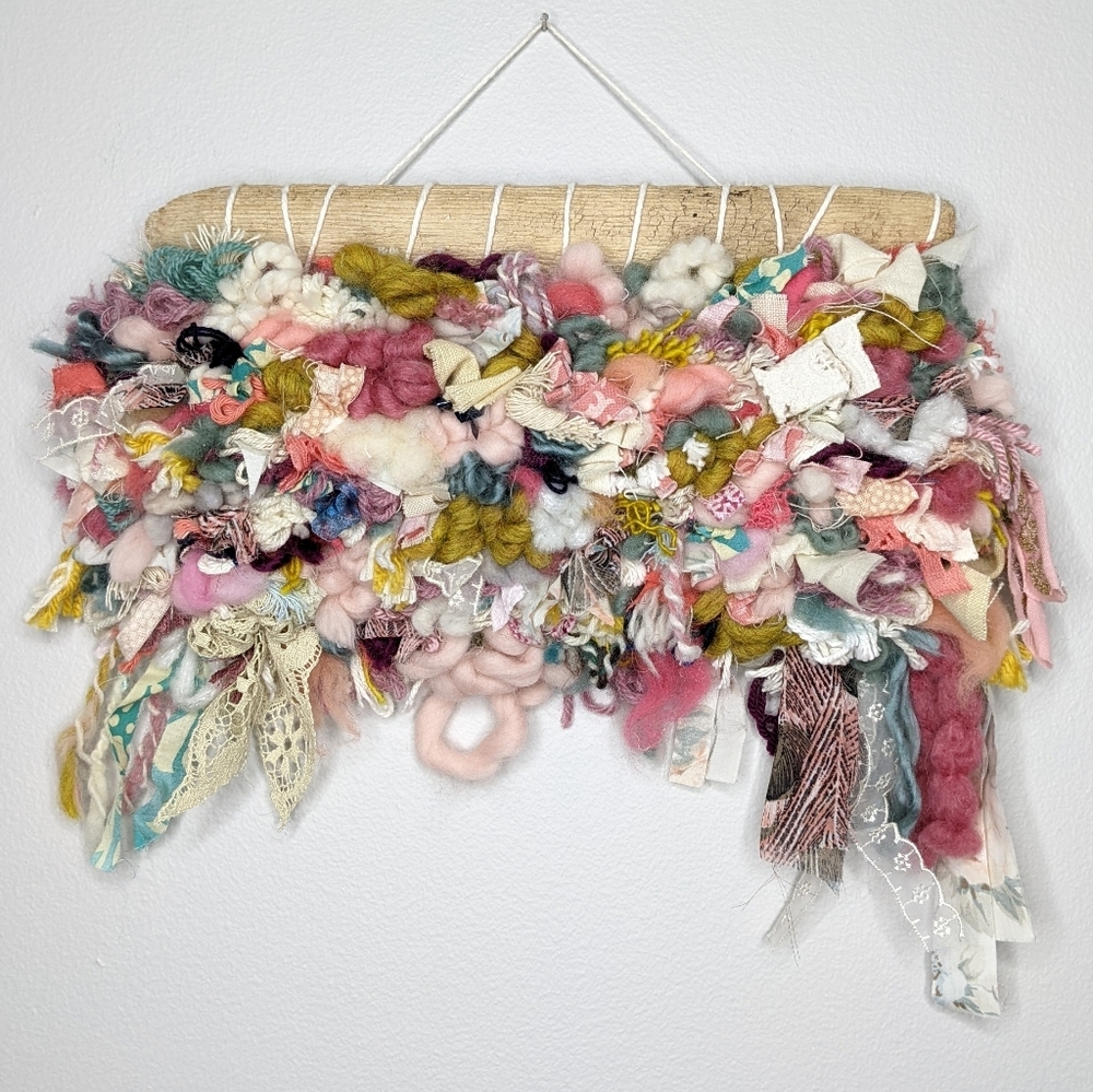 Handmade boho cream & pastel yarn woven wall hanging on driftwood